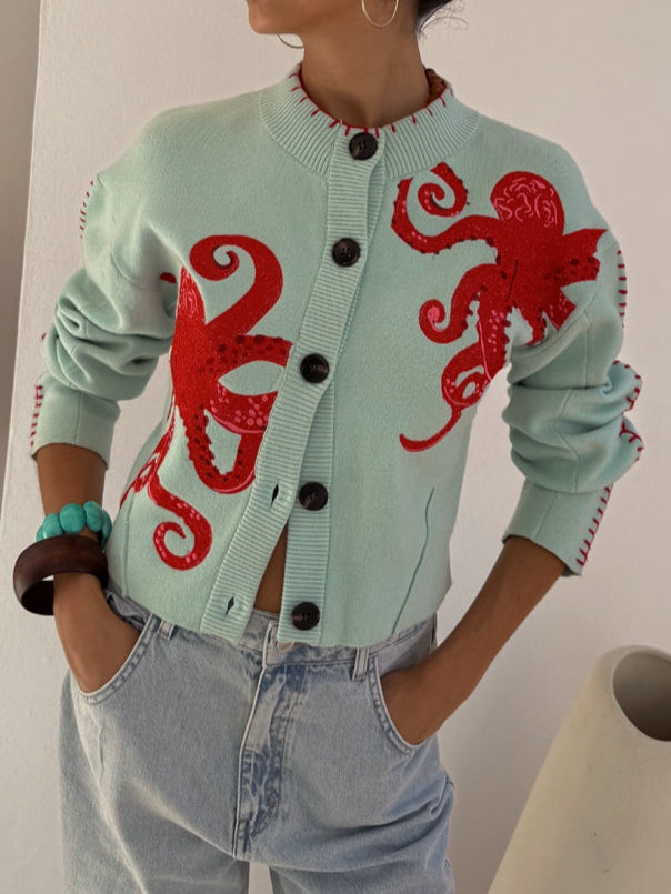 Women's cardigan with octopus motifs, a button front and a round neckline