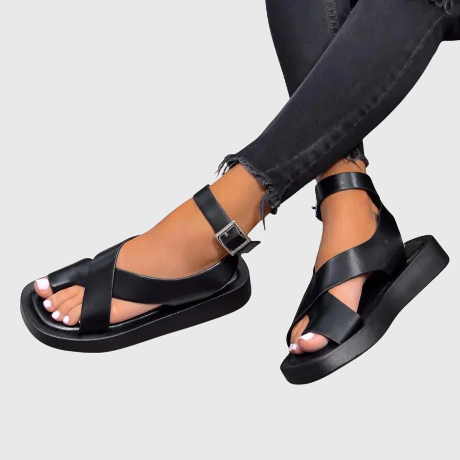 Women's platform sandals with crossing straps, an ankle strap and a platform sole