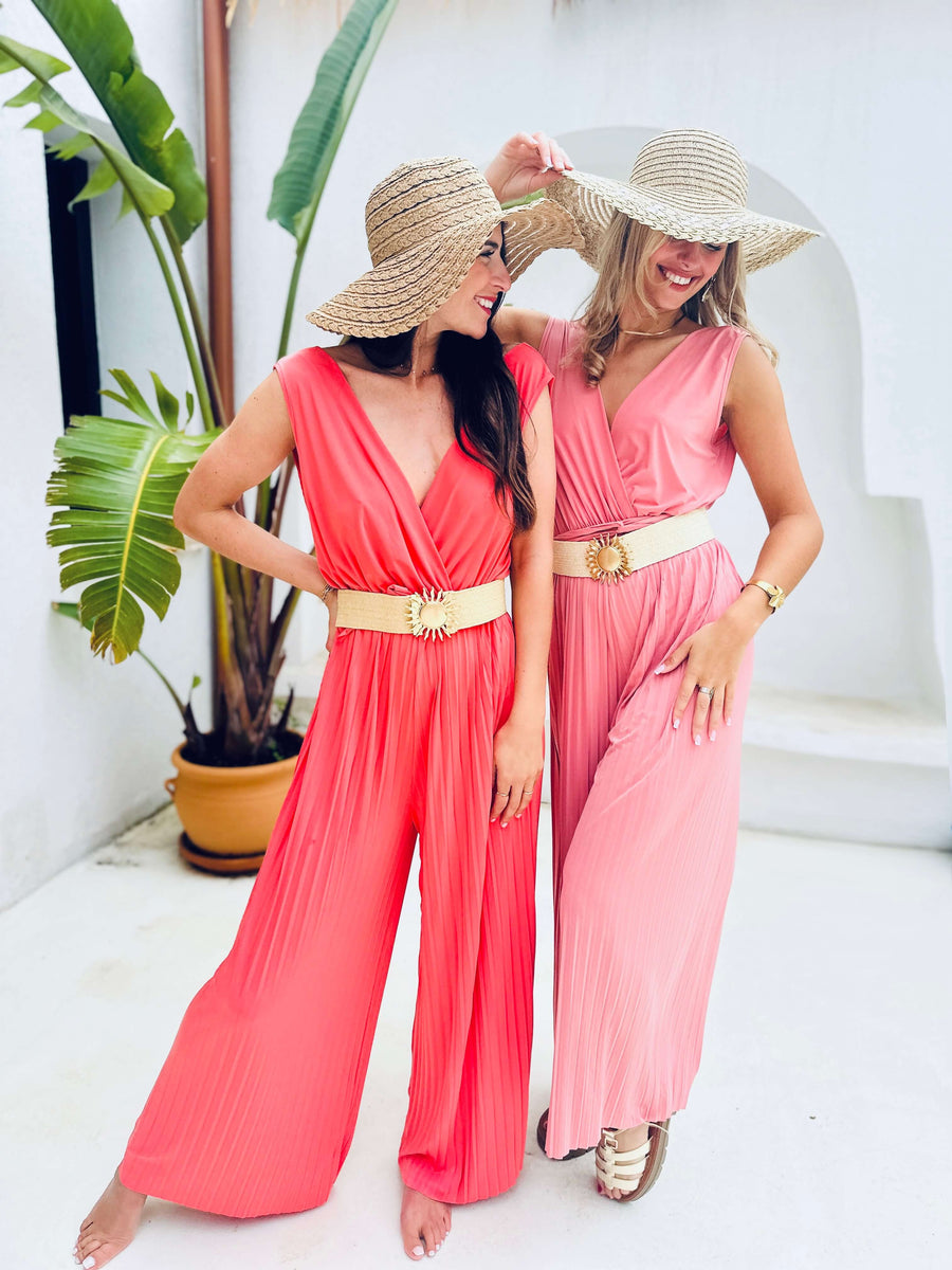 Women's jumpsuit with pleated detailing, a wrap-style front and a sleeveless shape