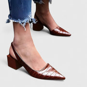 Women's heels with a pointed toe, a slingback strap and a block heel