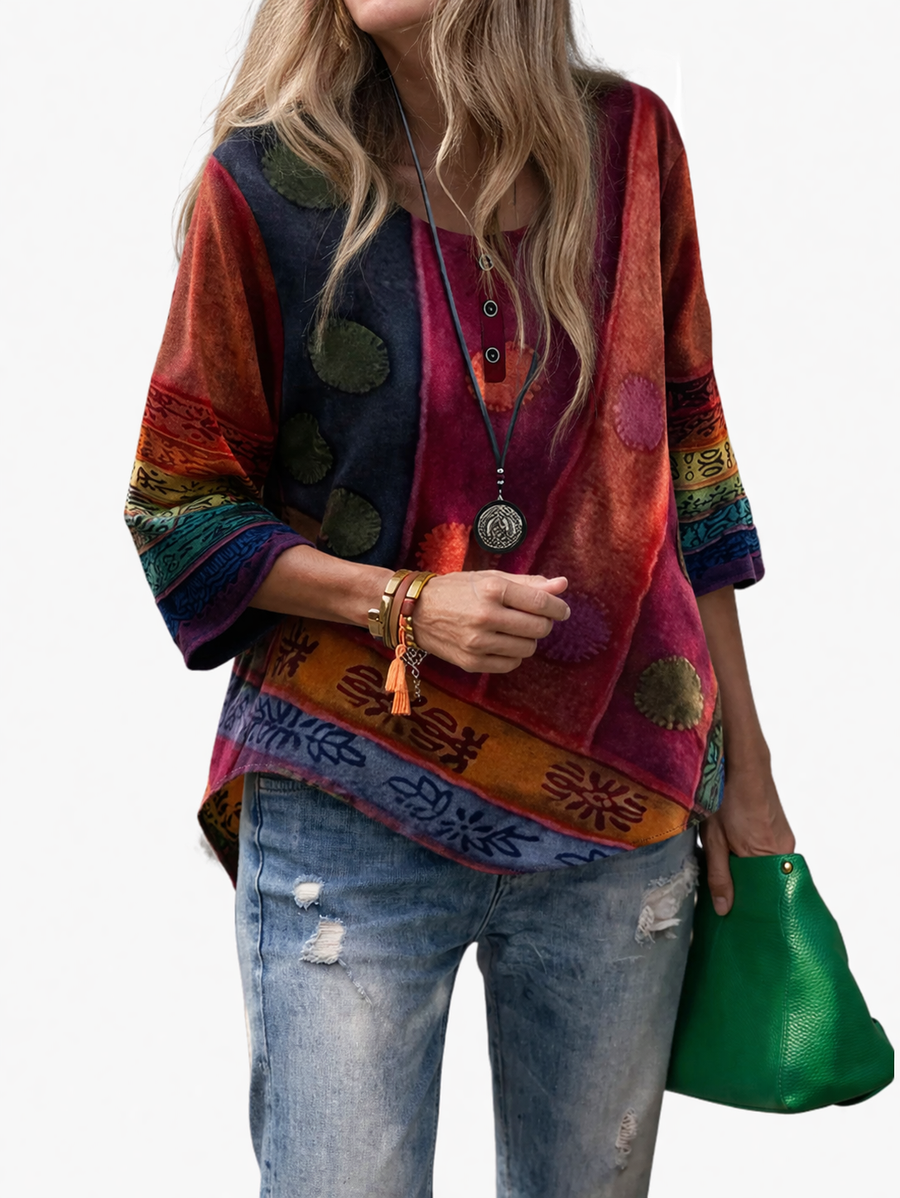 Women's blouse with an abstract print, a button neckline and elbow-length sleeves