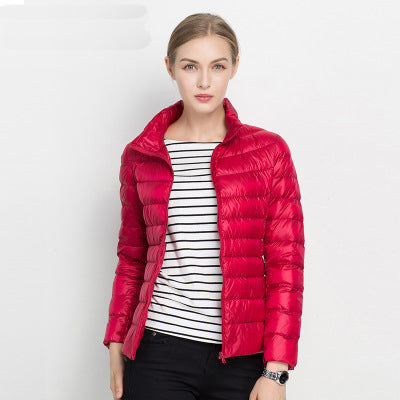 Godiva | Lightweight Waterproof Down Puffer Jacket in Navy