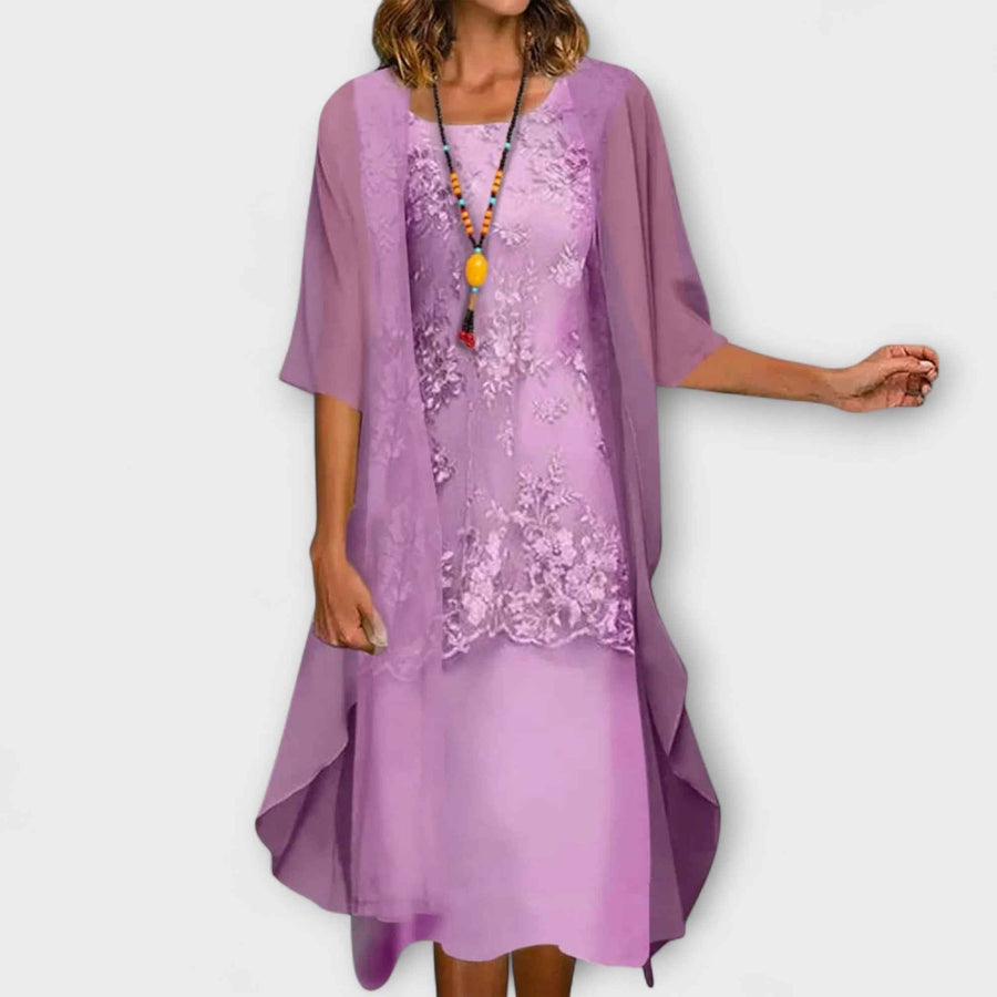Women's midi dress with lace panels, a round neckline and elbow-length sleeves