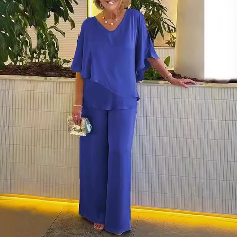 Women's trouser set with a V-shaped neckline, short sleeves and an asymmetric hem