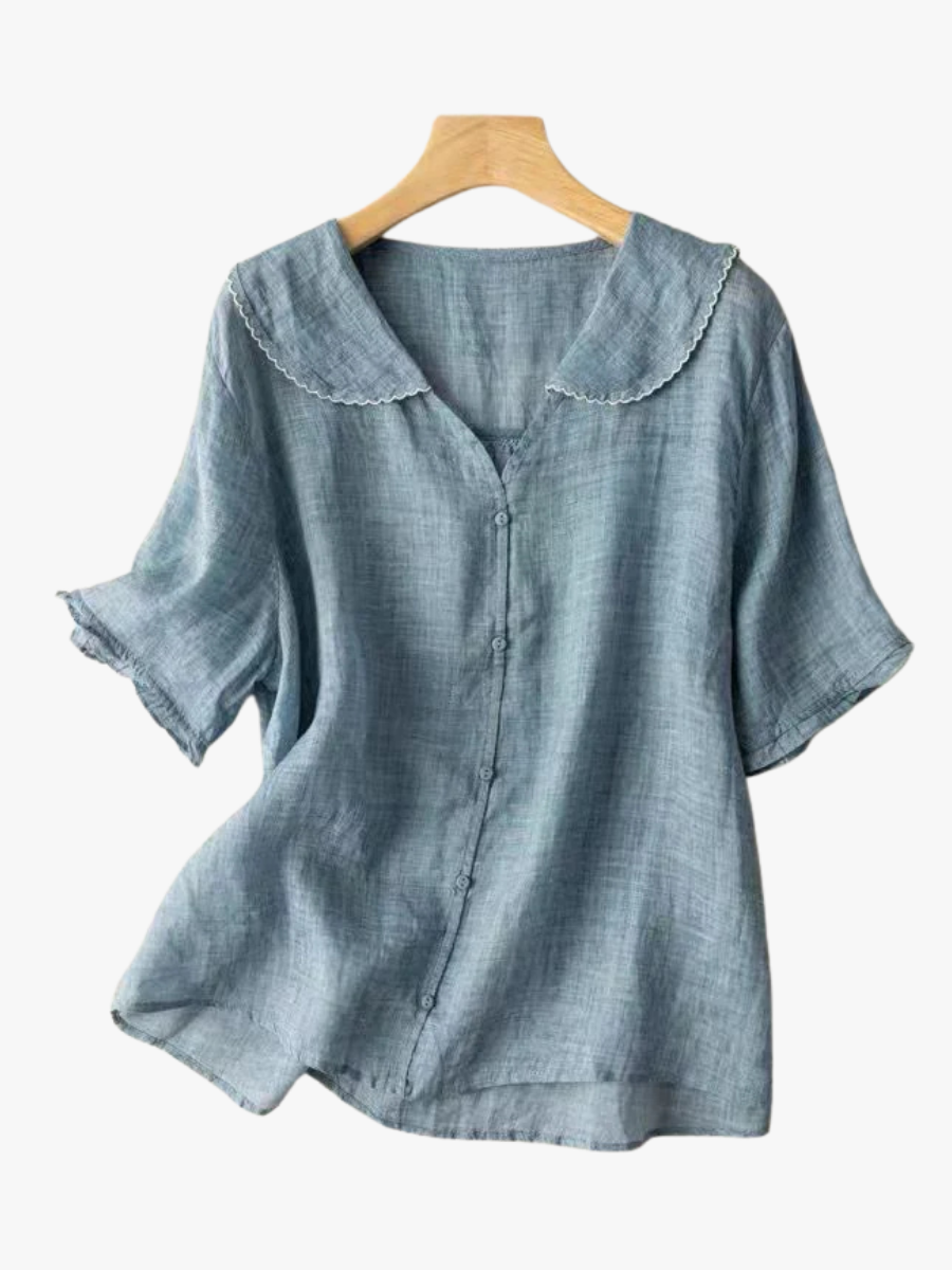 Women's blouse with a rounded collar, a button front and elbow-length sleeves