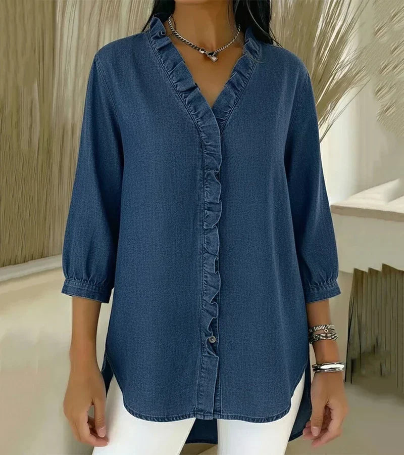 Women's shirt with a ruffled placket, a notched neckline and elasticated sleeve cuffs