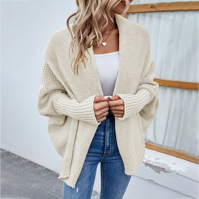 Women's cardigan with a draped shawl collar, an open front and long sleeves