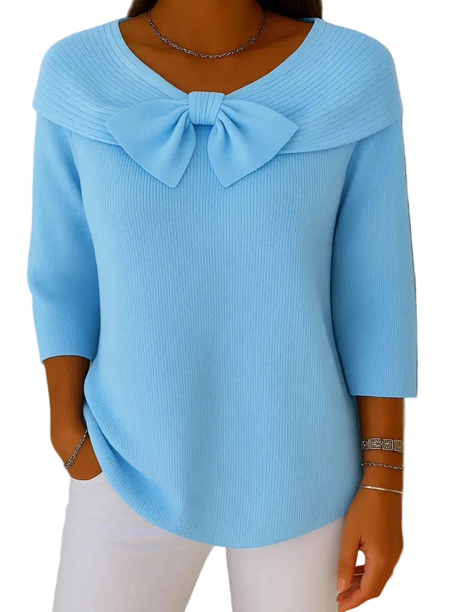 Women's jumper with a bow detail, a foldover collar and elbow-length sleeves