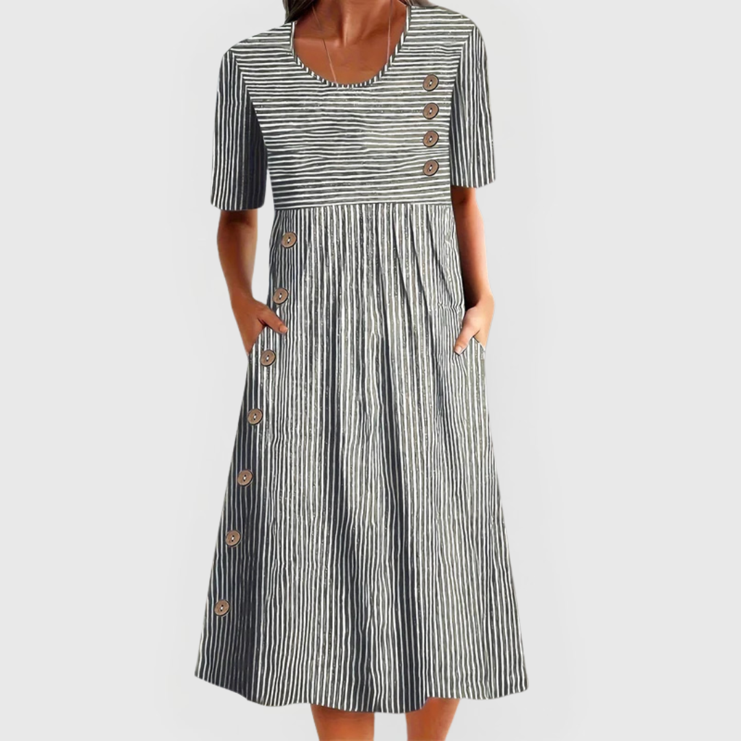 Women's midi dress with decorative buttons, elbow-length sleeves and side pockets