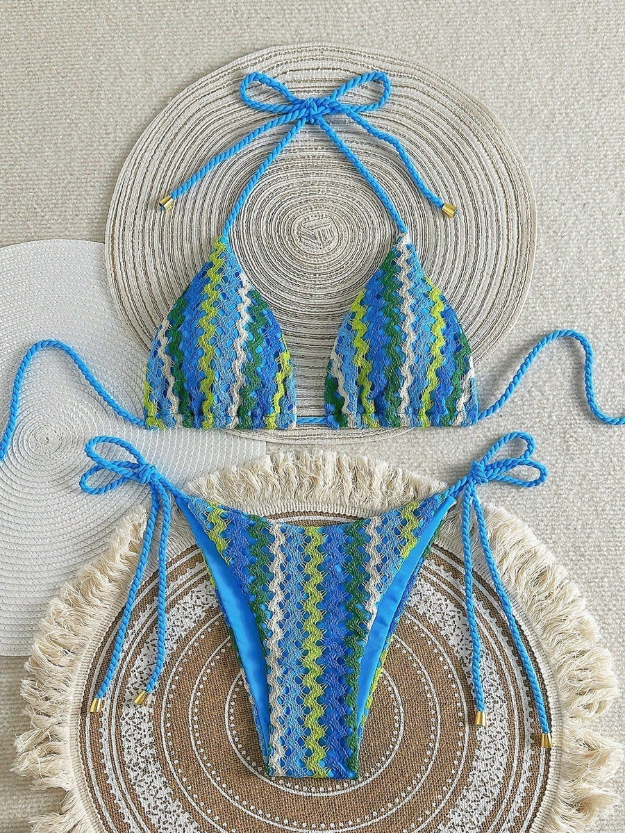 Women's bikini with a striped pattern, triangle-shaped cups and a halterneck design