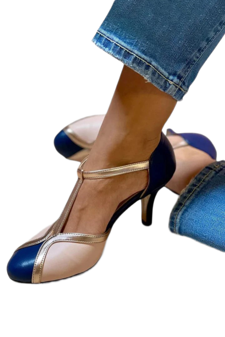 Women's heels with a T-shaped strap, contrasting panels and a closed toe