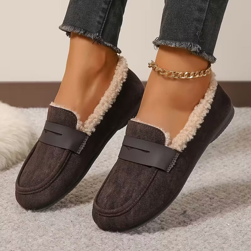 Women's loafers with a textured lining, an apron-style front and a slip-on design