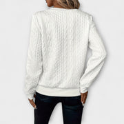 Women's jumper with a zipped neckline, long sleeves and ribbed cuffs and hem