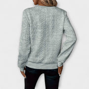 Women's jumper with a zipped neckline, long sleeves and ribbed cuffs and hem