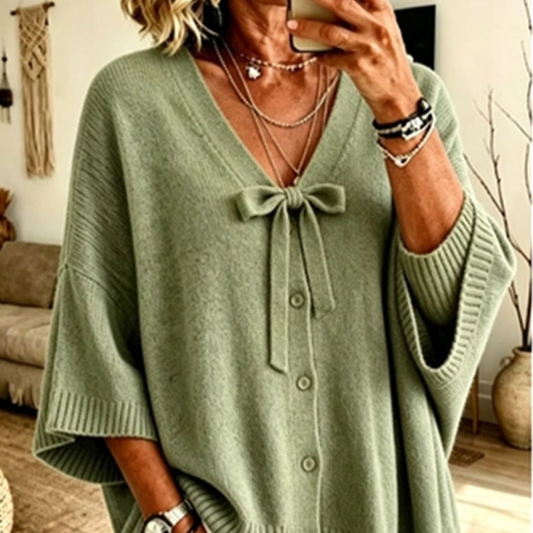 Women's cardigan with a neckline tie, a button front and wide sleeves