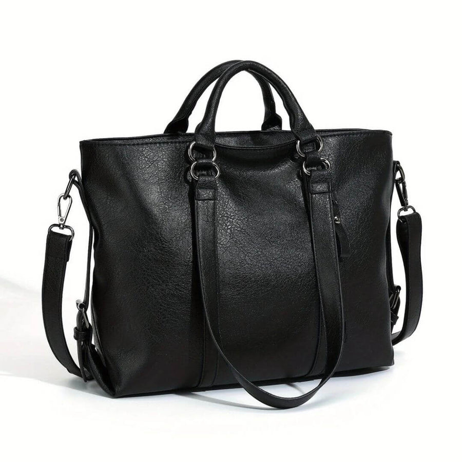 Women's handbag with twin carry handles, a shoulder strap and a rectangular shape