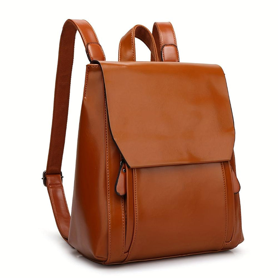 Women's backpack with a front flap, a top handle and twin back straps