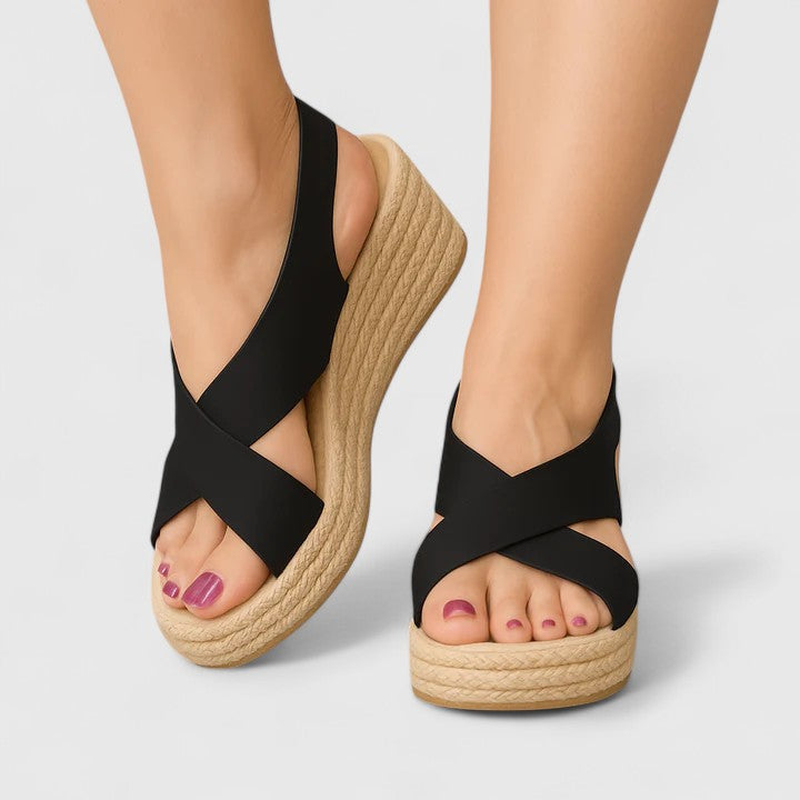 Women's wedge sandals with crossing straps, a slingback strap and an open toe