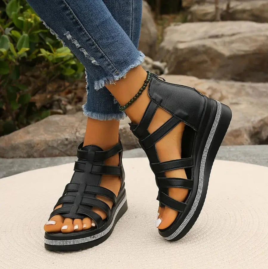 Women's wedge sandals with multiple straps, a slingback strap and a wedge heel