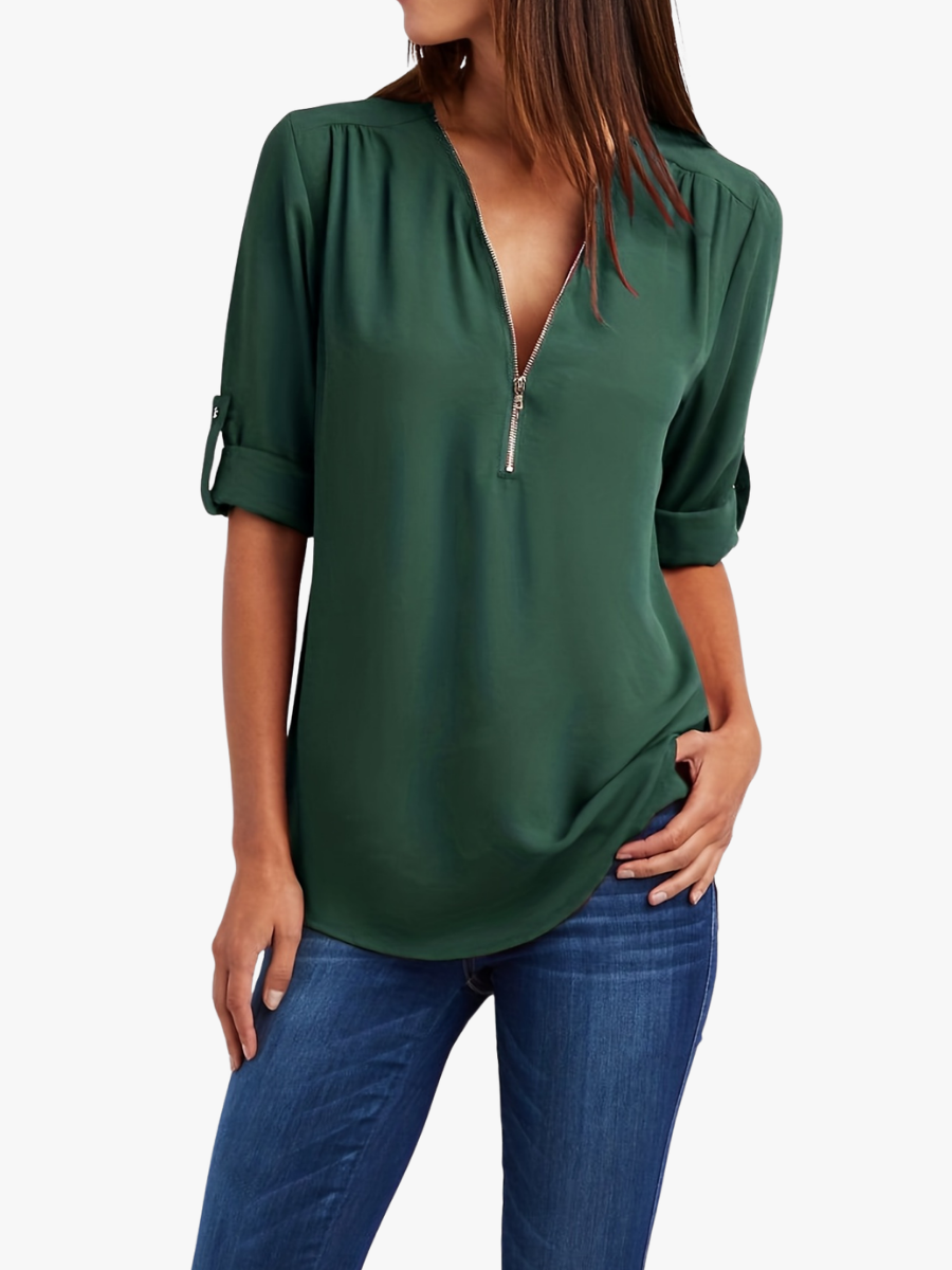 Women's blouse with a zipped neckline, a notched neckline and turned-up sleeves